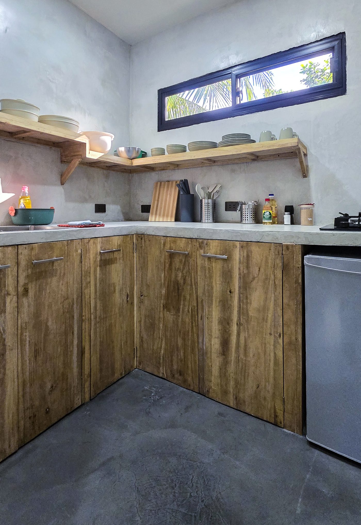 Fitted kitchen with wooden cabinets